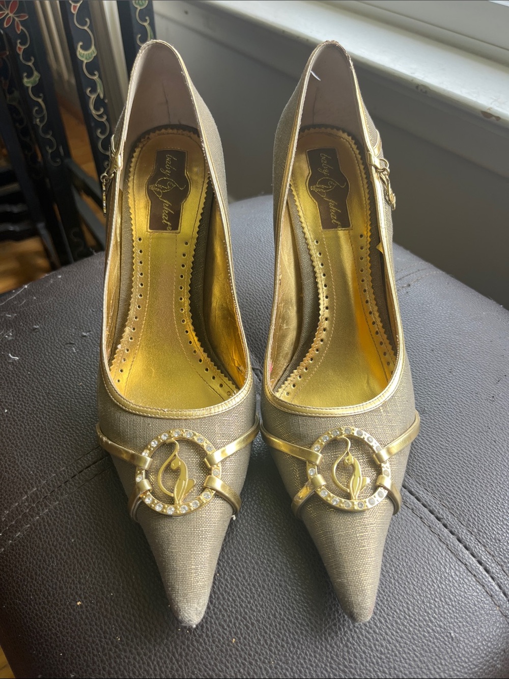Baby Phat Metallic Gold Pointed-Toe Heels with Decorative Emblem